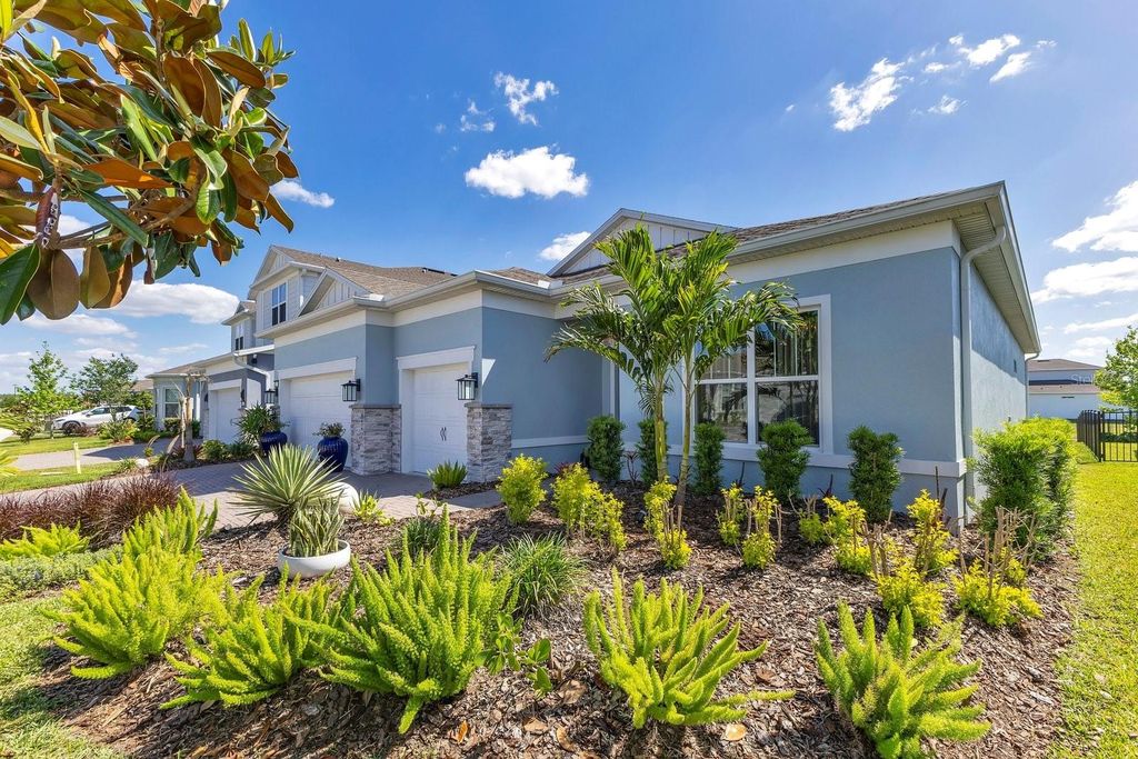 Photo of 13831 Tybee Beach Lane, Orlando, FL 32827 (MLS # O6396910)