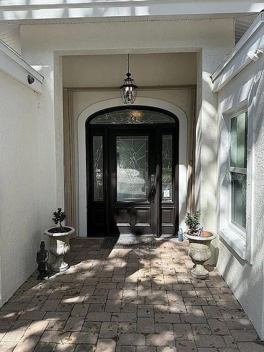 INCREDIBLE 2025 REMODELED WATERFRONT POOL HOME ON SIESTA KEY! FANTASTIC VIEWS OF THE LARGE POOL AREA AND GRAND CANAL THROUGH WALL OF WINDOWS ALL ALONG BACK OF HOME. GOOD FOR ENTERTAINING WITH GREAT ROOM AND OPEN KITCHEN. BEAUTIFUL TILE WORK AND IMPRESSIVE MASTER SUITE WITH PHENOMENAL MASTER BATH. HOME IS FRESHLY PAINTED, HAS BRAND NEW STAINLESS STEEL APPLIANCES IN GORGEOUS KITCHEN, NEW QUALITY LIGHTS AND FANS, MANY UPGRADES,  DEEP BOATING WATER WITH DIRECT ACCESS TO THE BAY AND GULF, DOCK AND BOAT LIFT. MATURE LANDSCAPING IN PLACE AND NATURE LOVERS WILL ADORE THIS FRONT YARD WITH ITS GORGEOUS OAKS AND PALMS AND MANY VARIETIES OF BIRDS THAT VISIT HERE. COME AND CLAIM YOUR SPOT ON AMAZING SIESTA KEY AND ENJOY THE TROPICAL BREEZES, PRISTINE BEACHES, AND FANTASTIC FISHING AS WELL AS THE CONVENIENCE OF THE DINING, ENTERTAINMENT AND CULTURAL EVENTS OF SARASOTA. DON'T LET THIS ONE SLIP AWAY!