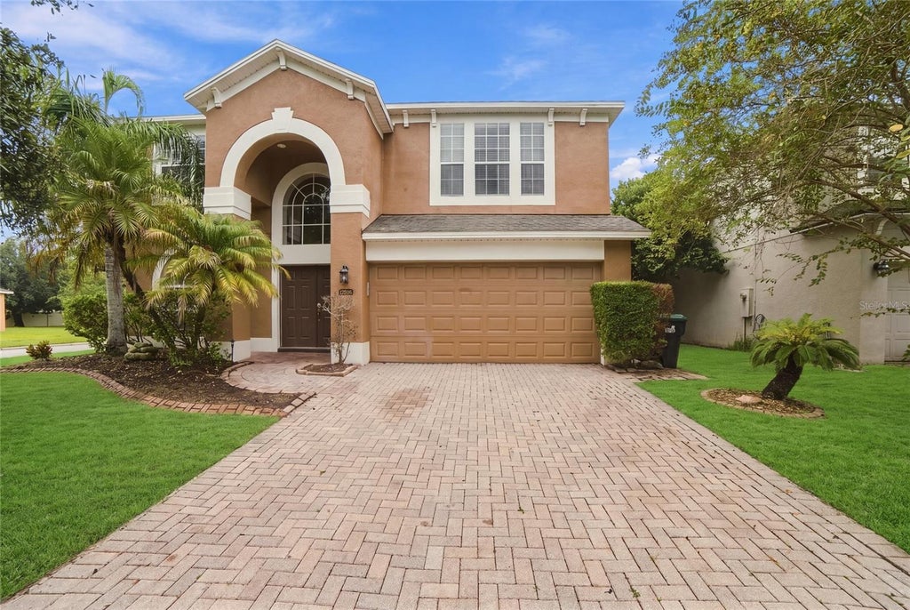 Photo of 12805 Moss Park Ridge Drive, Orlando, FL 32832 (MLS # O6446435)