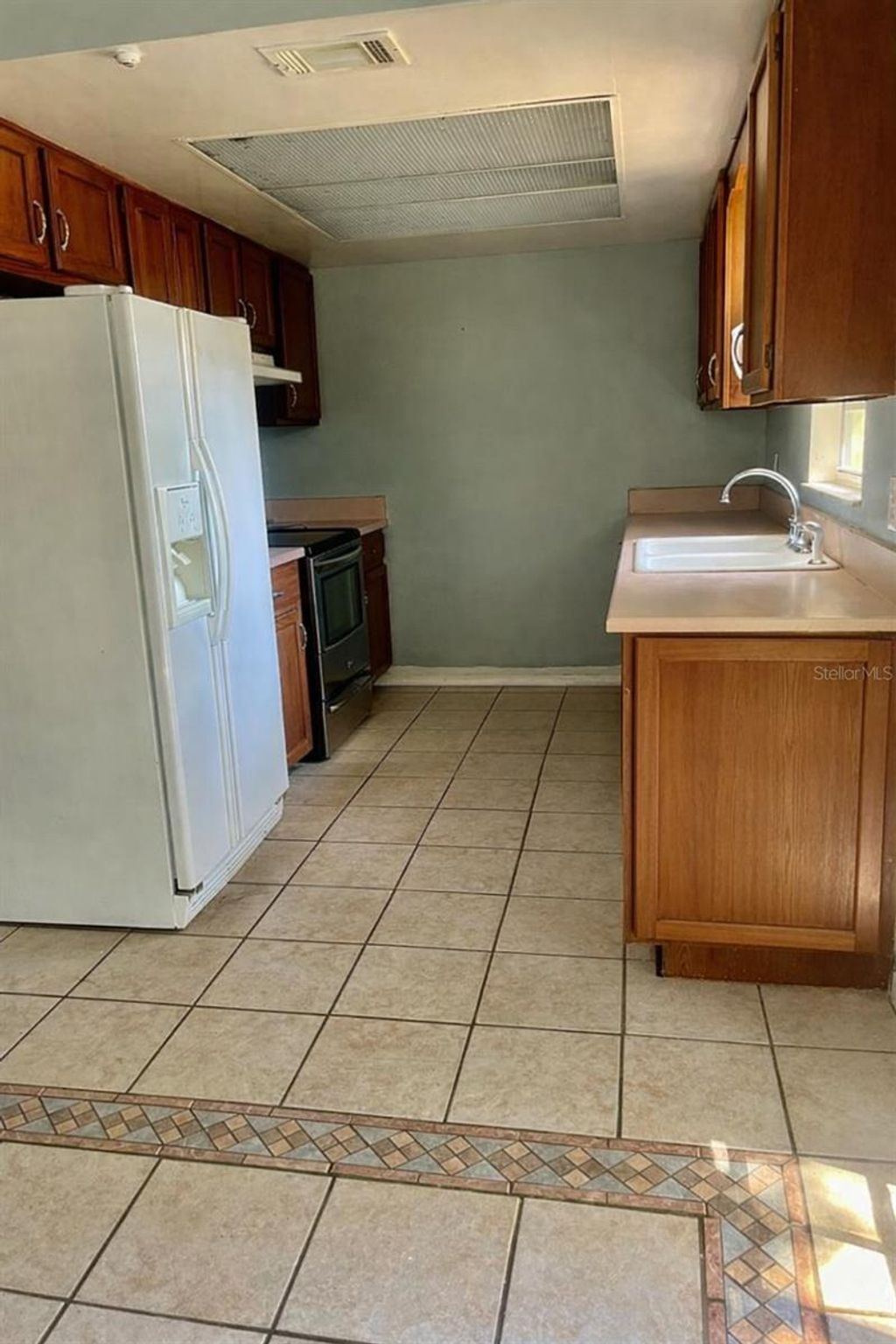 Photo of 235 Crabtree Avenue, Orlando, FL 32835 (MLS # O6380853)