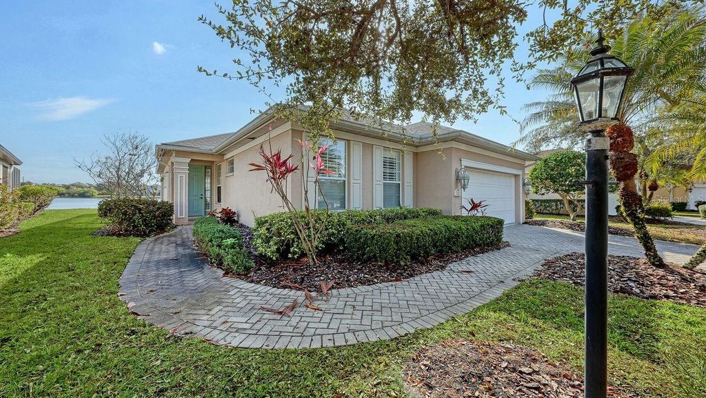 Photo of 7423 Sea Island Lane, Bradenton, FL 34201 (MLS # A4683498)