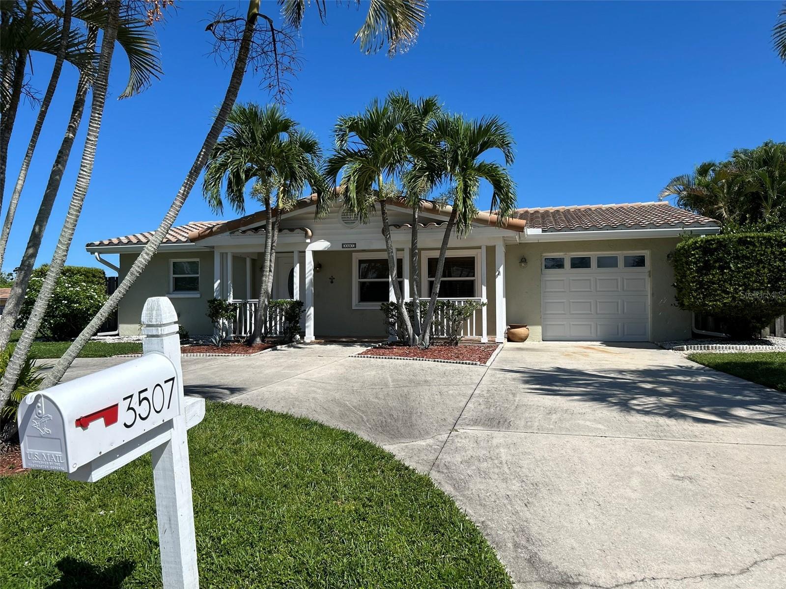 Sarasota Village Green Golf Course 3/2 home on a beautifully landscaped corner lot. The back yard is fully fenced and the home has a spacious lanai and swimming pool. The open floor plan lends itself to views of the back yard from the family room and kitchen.
Modern upgrades throughout and new LVP flooring in every room. Attached 1 car garage and convenient parking in the circular driveway.
The home has 220V outlet to charge your electric vehicle.