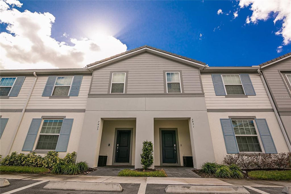 Photo of 7451 Oakmoss Loop, Davenport, FL 33837 (MLS # O6387982)