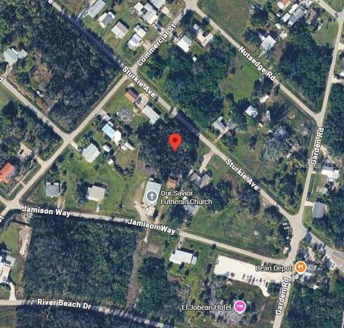 Photo of 4473 Sturkie Avenue, Port Charlotte, FL 33953 (MLS # C7528503)