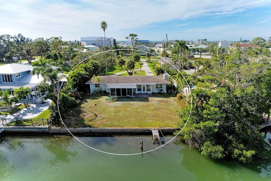 Yes, it’s a TEAR DOWN. No, you’re not moving into this 2bed/2bath home unless your dream is a “1960s vintage hurricane model.” But if you’re the kind of buyer who understands that LOCATION IS EVERYTHING—welcome to your once-in-a-lifetime, waterfront GOLDEN TICKET. Sitting directly on Lyons Bay, this Nokomis property is the kind coastal-lifestyle buyers drool over while scrolling Zillow at midnight. With 85 feet of concrete seawall, this is your blank canvas to build the dock of your dreams—go big, go bigger, or go “I need a lift that can handle whatever boat I impulse-buy next.” And let’s talk boating: This is hands-down the best boating location in all of Sarasota County. Why? Because you get instant Gulf access—zero bridges, zero nonsense, zero waiting. From backyard to open water in minutes. Dolphins, sunsets, sandbars… you know, the whole “why people move to Florida” starter pack. Prefer kayaking or paddleboarding? Drop in right from your property. Love waterfront restaurants? Pop’s Sunset Grill is basically your new neighbor—close enough to walk, golf-cart, or paddleboard to for dinner. Beaches? Nokomis Beach is so close you’ll smell the sunscreen from your driveway. Oh, and did we mention? NO HOA. NO deed restrictions. NO committees asking about paint colors. Want to fence the property? Sure. Want to build a killer modern coastal home with a swim-up pool bar? Absolutely. Want to park your boat, jet skis, kayaks, eFoil, golf cart, and maybe a pet dolphin sculpture collection? Go wild. Public water already on site… you just need a septic system and a bulldozer. (Yes, really. Bring the bulldozer.) Outdoor enthusiasts, boaters, fishermen, sunset-chasers, wildlife watchers: this property wasn’t just made for you—it’s practically flirting with you. Build the dream. Live the dream. Own a slice of the Gulf Coast lifestyle people fly down here just to post on Instagram. *** Sarcasm is FREE, the property is not.***