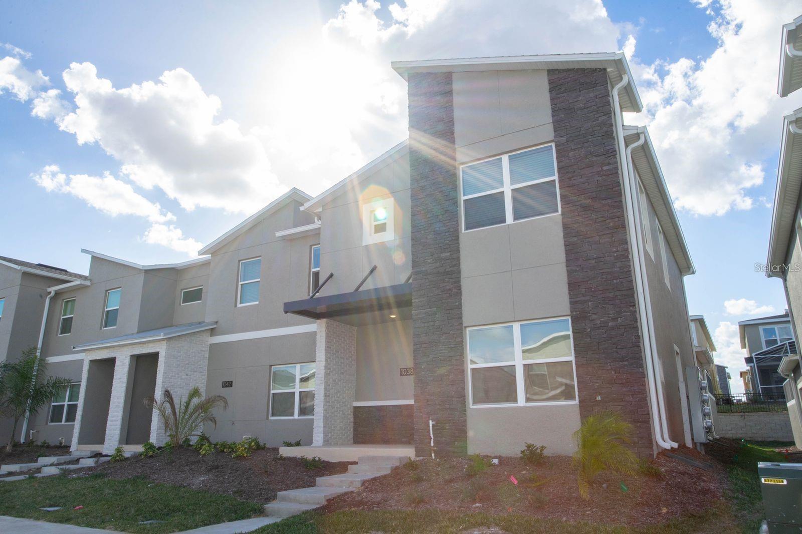 Fully Furnished Turnkey Townhouse 5 Bed, 4 Bath at Champions Gate Resort! Experience Luxury Living Just Minutes from Orlando's Top Attractions. Townhouse is the epitome of modern living, offering an unmatched blend of convenience and entertainment for you and your guests. Property Highlights: Turnkey Elegance: Your new townhouse comes fully furnished, allowing you to move in hassle-free and start enjoying the ultimate Orlando lifestyle from day one. Prime Location: Only minutes away from Orlando's premier attractions, making it the perfect retreat for residents and vacationers alike. Resort-Style Amenities: Dive into the luxury of Champions Gate Resort, where a world of entertainment awaits. Enjoy a resort-style pool, water slides, cabanas, lazy river, arcade room, gym, and much more! Open Concept Living: Step into a lower level that seamlessly combines kitchen, living, and dining spaces. The living room, adorned with a comfortable sofa and flat-screen TV, invites relaxation and family time. The fully equipped kitchen boasts stainless steel appliances, ample counter and cabinet space, and a spacious island with seating for four. The adjacent dining area, with a table for eight, sets the stage for delightful meals. Private Outdoor Oasis: Step outside onto the patio deck, where your own private splash pool awaits. Ideal for unwinding after a day of adventures, the deck also features outdoor dining and loungers, creating a perfect setting for memorable moments under the Florida sun. Bedroom Bliss: First Floor Retreat: Discover a beautifully decorated bedroom with a queen-size bed and flat-screen TV, along with another bedroom showcasing a full over twin bunk bed. Masterful Upstairs Haven: Ascend to the second floor, where the master bedroom beckons with a king bed and an ensuite bathroom boasting double sinks and a walk-in shower. Two additional guest bedrooms, one with a king-size bed and another with enchanting Disney-themed decor, complete the upstairs retreat. Your Chance for a New Lifestyle: Seize the opportunity to own a fully furnished turnkey townhouse at Champions Gate Resort! Whether you're seeking a vacation retreat, this property offers a chance to embrace the luxurious and carefree Florida lifestyle.
