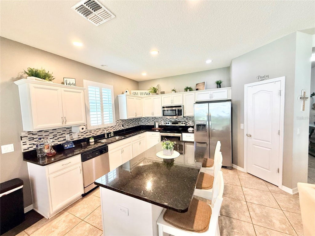 Photo of 2769 Limerick Circle, Grand Island, FL 32735 (MLS # G5118311)
