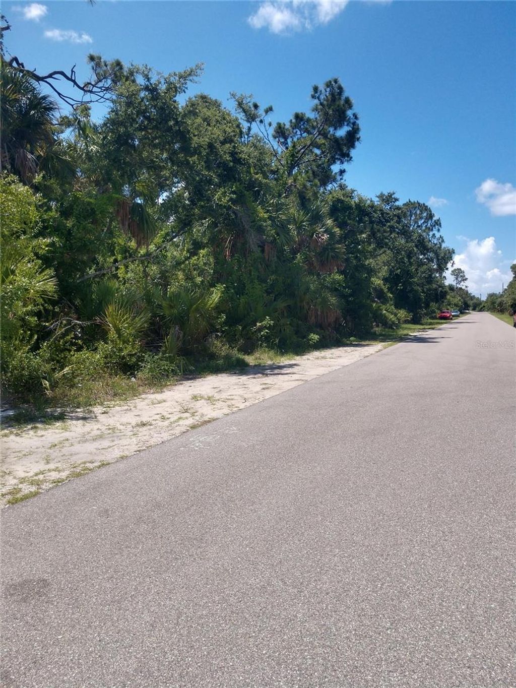 Photo of 1420 Kenesaw Street, Port Charlotte, FL 33948 (MLS # O6266231)