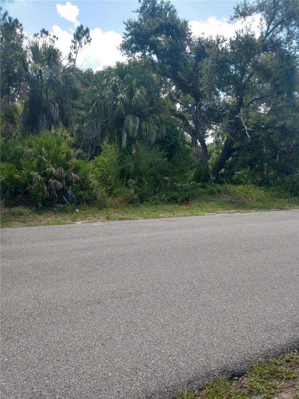 Photo of 1420 Kenesaw Street, Port Charlotte, FL 33948 (MLS # O6266231)