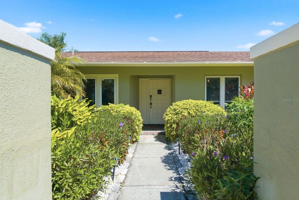 Photo of 1680 Cinnamon Lane, Dunedin, FL 34698 (MLS # TB8489178)