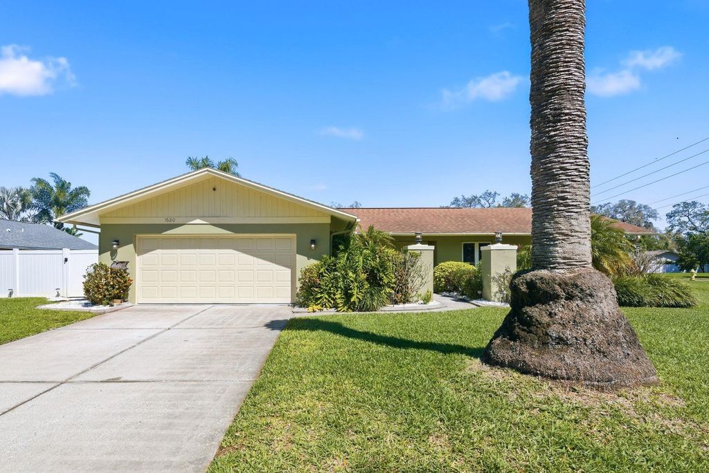 Photo of 1680 Cinnamon Lane, Dunedin, FL 34698 (MLS # TB8489178)