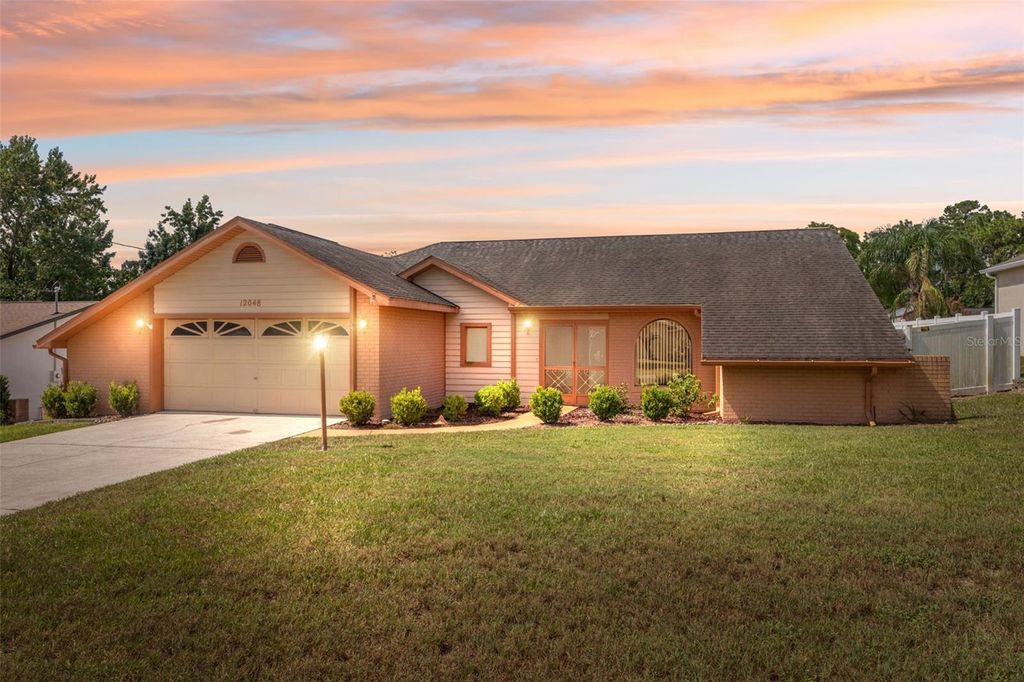 Photo of 12048 Cradock Street, Spring Hill, FL 34608 (MLS # W7877970)