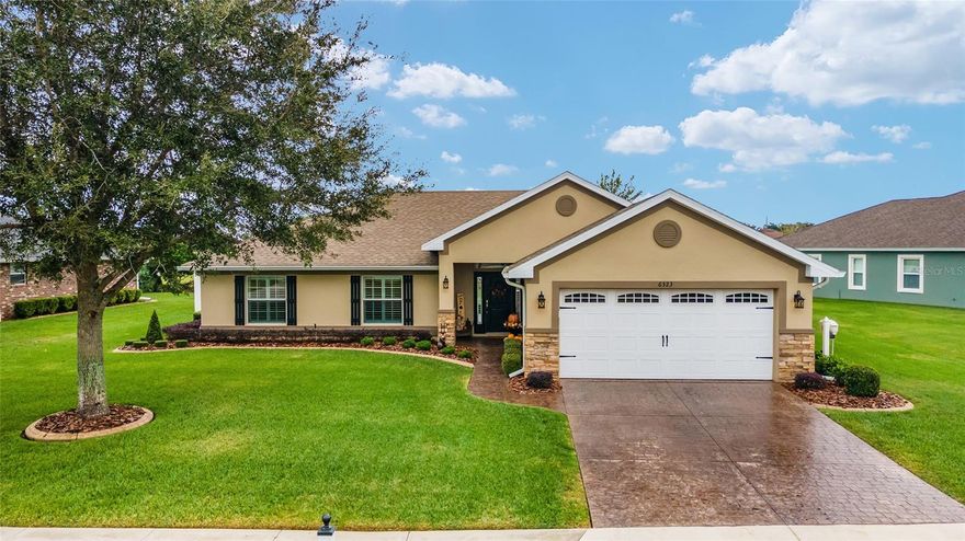 BEAUTIFUL 4/2/2 home in the popular SW Heathbrook Preserve neighborhood!  Great curb appeal with custom landscaping!  IMMACULATE ~ MOVE-IN READY!  2023 AC.  Semi-open floor plan with vaulted ceilings, plantation shutters throughout, and no carpet.  Kitchen has a breakfast bar, granite counters, SS LG appliances, and pantry.  Split bedroom plan.  Master suite has walk-in closet, dual sinks, granite counters, walk-in shower, garden tub, and water closet.  Laundry room includes washer/dryer.  Enjoy the backyard ~ private and peaceful with beautiful views!  Great school district!  Excellent location convenient to shopping, dining, medical, entertainment, WEC, and I-75!