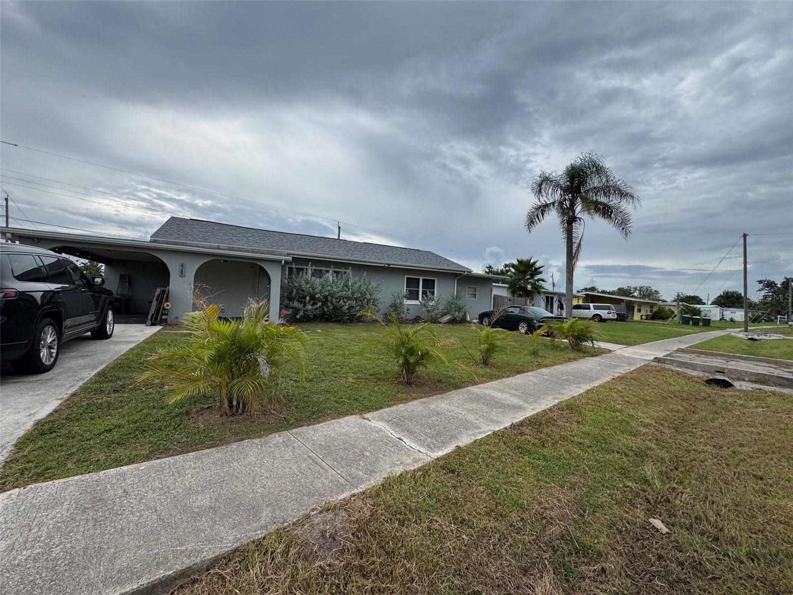This charming 2-bedroom, 1-bath home offers a cozy and inviting layout perfect for first-time buyers, downsizing, or investment opportunities. The light-filled living spaces flow into a functional kitchen making meal prep simple and enjoyable. Outside, the spacious backyard provides room for gardening, entertaining, or simply relaxing in the Florida sunshine. Conveniently located near shopping, dining, parks, and just a short drive to Gulf Coast beaches, this home combines comfort, affordability, and a great location.