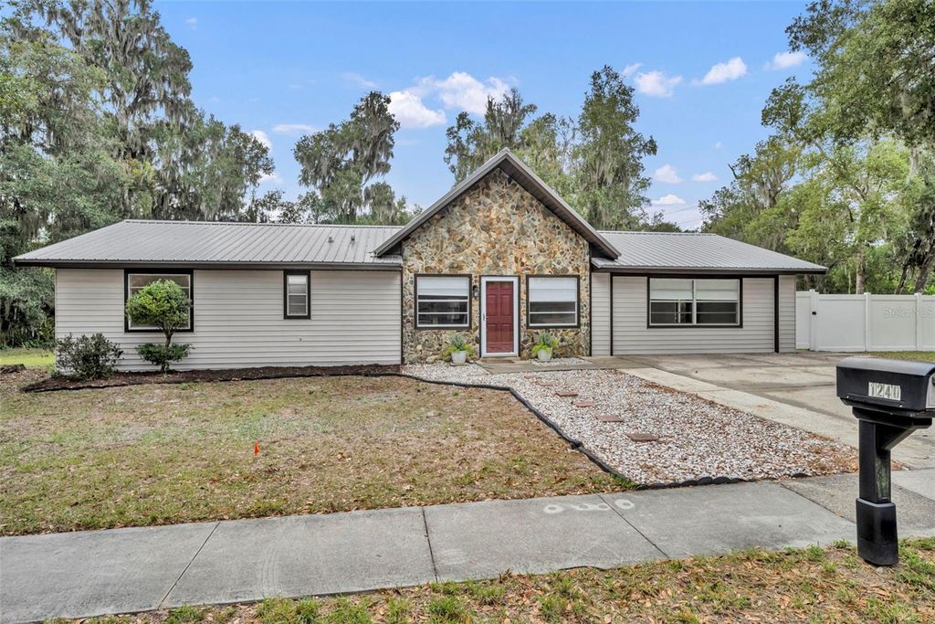 Photo of 1240 W Voorhis Avenue, Deland, FL 32720 (MLS # O6364812)
