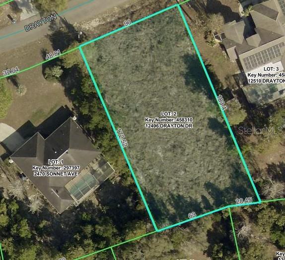 Photo of 12496 Drayton Drive, Spring Hill, FL 34609 (MLS # W7890690)