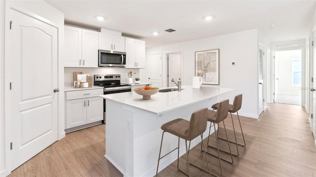 Photo of 133 Heirloom Drive, Ormond Beach, FL 32174 (MLS # O6415359)