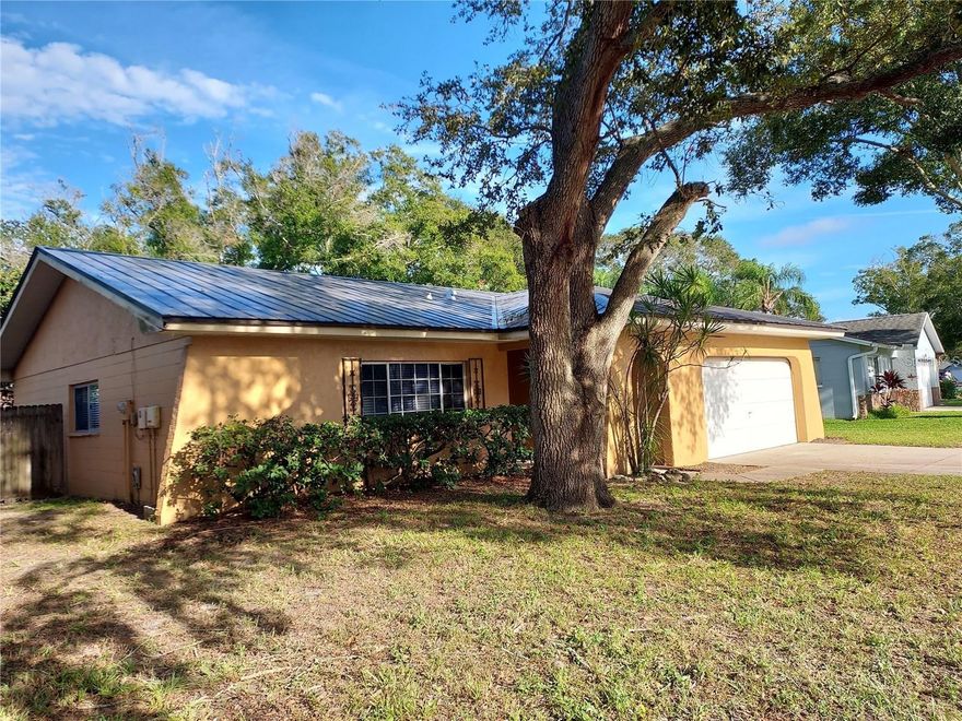 Beautiful home in Beacon Groves. Palm Harbor University. A long-term lease is available. Spacious rooms and new appliances. Thousands of upgrades. Electric fireplace with remote in the family great room. all new flooring throughout. Huge screened-in Lania and large yard with a privacy stockade fence. Other features include Stainless steel appliances. flat top stove with double oven, double door refrigerator with bottom freezer, oversize two car attached garage with door automatic door opener, washer, dryer hook-up with wash basin. Shaded trees in front and back yard. Lots of shopping is close by. #PalmHarborUniversity.