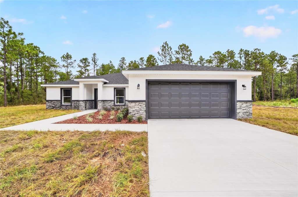 Photo of 23636 NW Water Oak Avenue, Dunnellon, FL 34431 (MLS # O6428325)