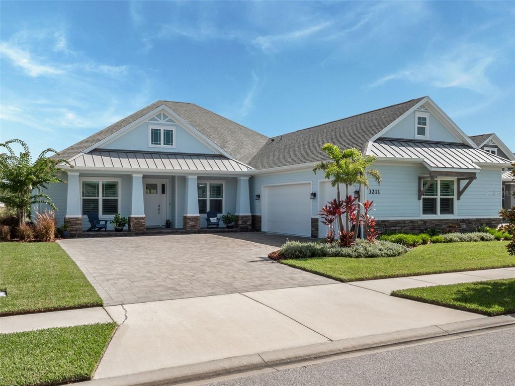 Photo of 3211 Modena Way, New Smyrna Beach, FL 32168 (MLS # O6335454)
