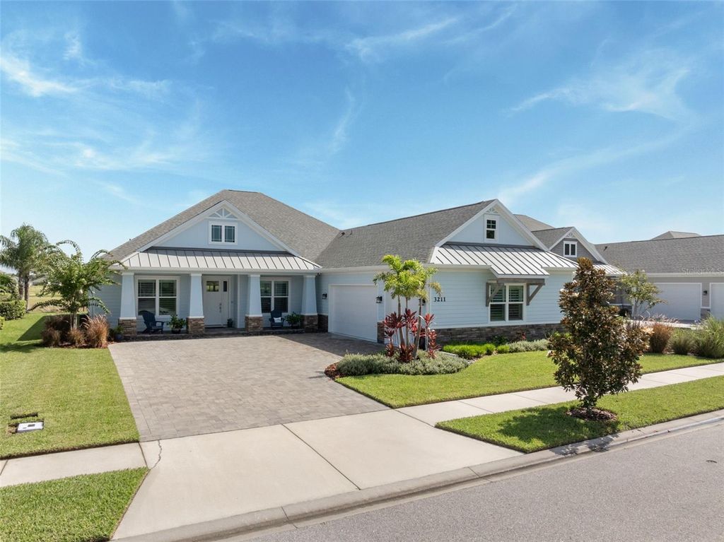 Photo of 3211 Modena Way, New Smyrna Beach, FL 32168 (MLS # O6335454)
