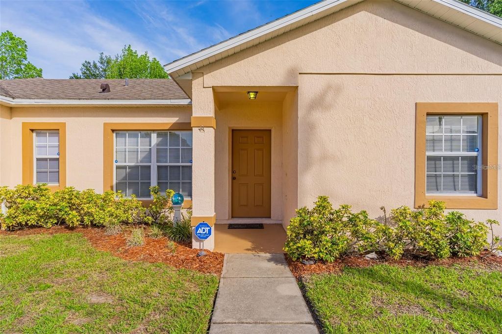 Photo of 7 Tamiami Way, Kissimmee, FL 34758 (MLS # O6427164)