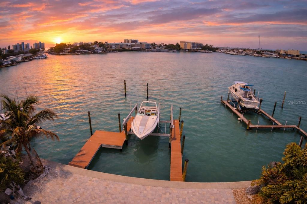 Photo of 352 145th Avenue E, Madeira Beach, FL 33708 (MLS # W7884617)