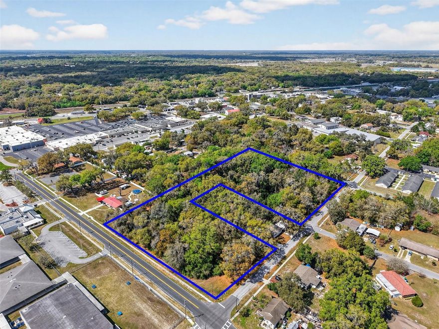 Location, Location, Location!! This property consists of 2 parcels totaling 3.84 acres with 835+ ft of road frontage located in Wildwood, FL. Wildwood serves as a major expansion area for The Villages! The population in Wildwood has rapidly increased because of this expansion. Wildwood is located in the northern portion of the city area where The Villages has built new "Village" communities, such as De Luna, Desoto, and Monarch Grove.  The zoning on this property is RIO ( Residential Institutional Office). This zoning is designed to provide flexibility by combining residential uses with office and institutional (such as churches, community facilities, or daycares) functionalities, allowing for diverse property development. The possibilites are endless! Priced at the appriased value, appraisal available for review.