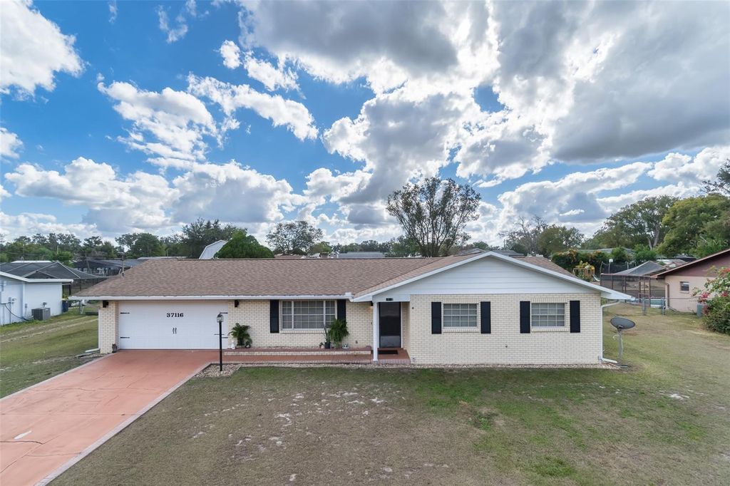 Photo of 37116 Price Drive, Zephyrhills, FL 33541 (MLS # TB8463630)