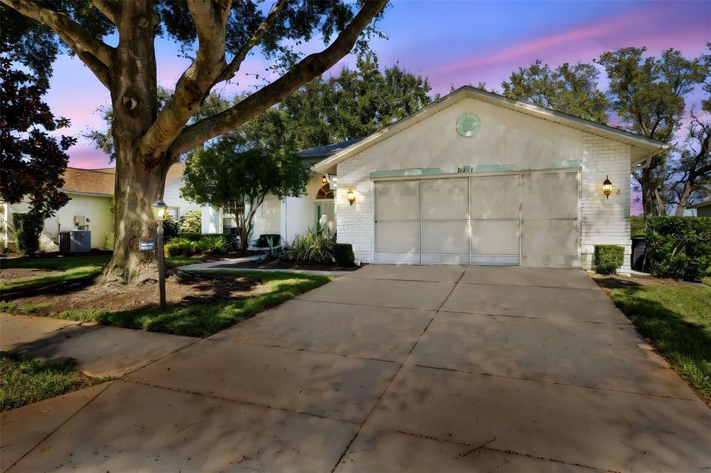 Photo of 11231 Sun Tree Road, Hudson, FL 34667 (MLS # TB8448088)