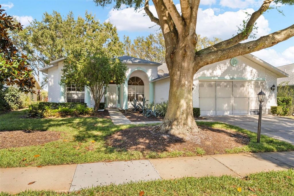 Photo of 11231 Sun Tree Road, Hudson, FL 34667 (MLS # TB8448088)