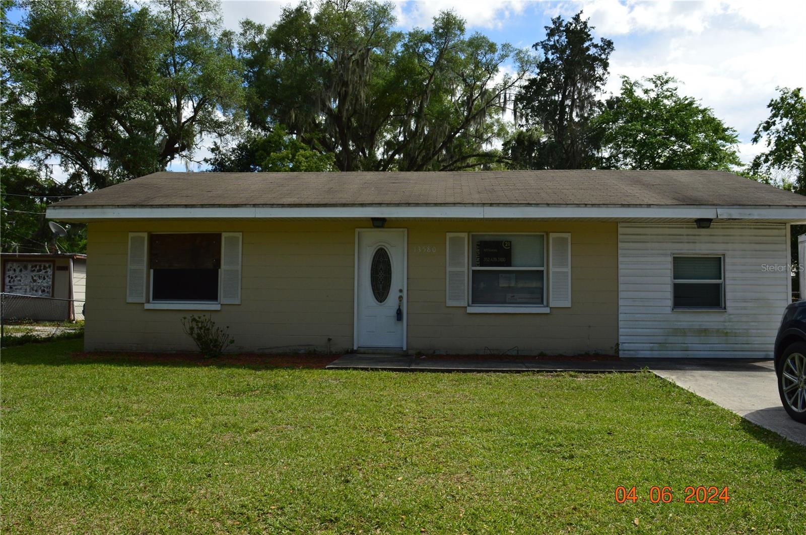 2 Bedroom, 1 bath home for sale in Ocklawaha. Home features tile flooring in main areas and laminate flooring in the bedrooms. Garage was enclosed into a bonus room, inside utility room with W/D hook-up with exterior door leading to the rear open patio. Backyard is privacy fenced and has a storage shed. Home is being sold as-is. Home is less than 5 miles from Lake Weir.