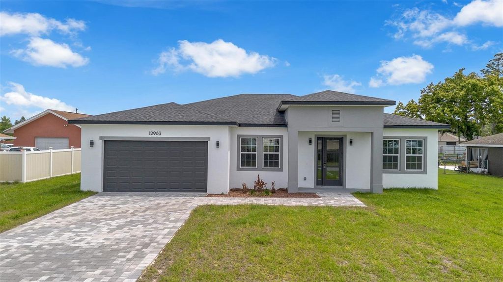 Photo of 12963 SW 72nd Terrace Road, Ocala, FL 34473 (MLS # O6399984)