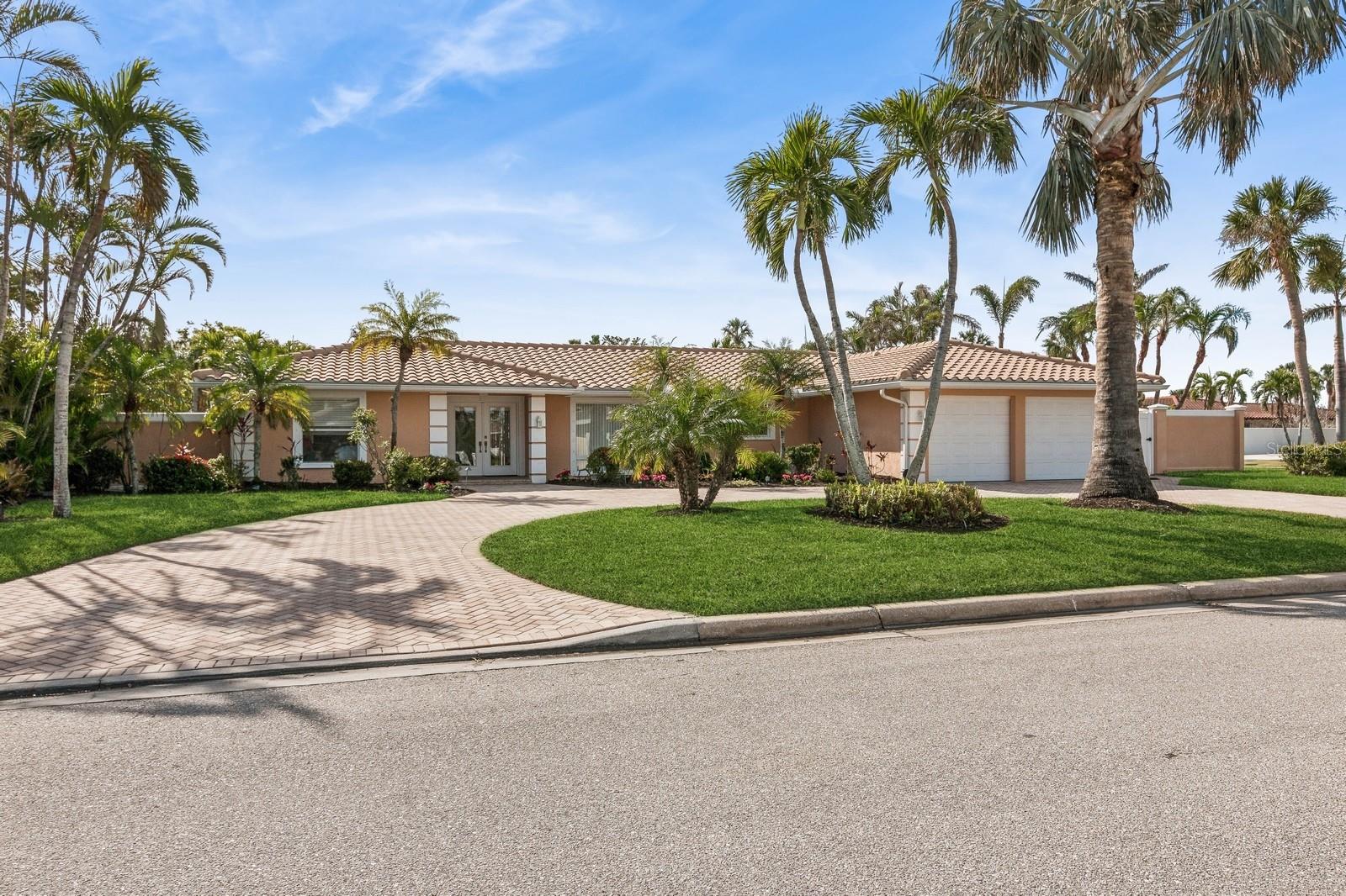 BIRD KEY Sarasota FURNISHED POOL Home for LEASE. Available UNFURNISHED or FURNISHED. This spacious three bedroom home is ready for move-in. Well designed floor plan allows privacy for all three bedrooms. This home features raised ceilings with stunning tray designs, property is both fenced and walled to allow maximum privacy, and situated on a large corner lot. Beautifully landscaped with tropical plantings to enjoy. The outdoor space boasts an over-sized deep swimming POOL, as well as a covered area to relax and entertain. The south west exposure of the rear yard captures colorful sunset views. Well maintained and well furnished home inside and out. Rent to include lawn and landscape care and weekly pool maintenance. Enjoy this great location close to DOWNTOWN SARASOTA, LIDO BEACH and ST. Armand's Circle. Just minutes away for shopping, restaurants, entertainment and events. The white sands beaches of Lido Key are waiting for your arrival. Bird Key is located in the heart of Sarasota's downtown bay front where you can experience the coveted coastal lifestyle. Call today to schedule a showing of this lovely home. Available for a seven months or longer lease. PET FRIENDLY.