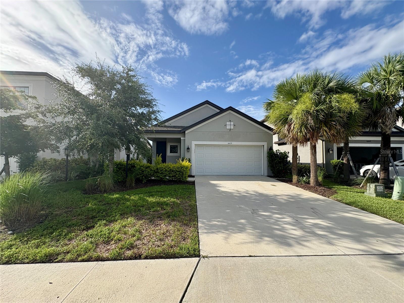 For Rent! Pet Friendly! Discover luxury and lifestyle in Park East at Azario, one of Lakewood Ranch’s most desirable new communities. This stunning 3-bedroom, 2-bathroom home with a dedicated office offers modern elegance, a functional floorplan, and tranquil pond views, all within a vibrant, amenity-rich neighborhood. Step inside to a bright and spacious interior featuring high ceilings, tile flooring throughout the main living areas, and an open-concept layout perfect for entertaining or relaxing. The chef-inspired kitchen is equipped with stainless steel appliances, granite countertops, a large island, and a walk-in pantry, seamlessly flowing into the living and dining areas. The primary suite is a private retreat with a walk-in closet and ensuite bath featuring dual vanities and a glass-enclosed walk-in shower. Two additional bedrooms and a separate office/flex room provide space for family, guests, or remote work. Step outside to your screened-in lanai overlooking a peaceful pond, where you can enjoy Florida’s beautiful weather and sunsets in a serene setting. Located in the heart of Lakewood Ranch, Park East at Azario offers access to top-rated schools, golf, dining, shopping, and scenic parks, with resort-style amenities on the way. Washer and dryer included with the home.