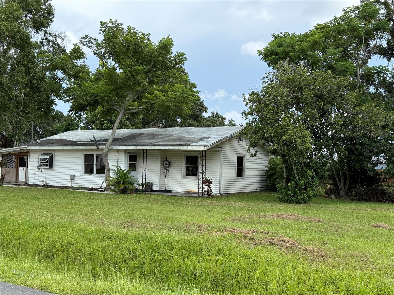 Investor Special!
This cozy 2-bedroom, 2-bathroom home offers immense potential in creating your dream home. Nestled on almost 1/2 an acre corner lot. With some TLC, this charming house can be transformed into a modern retreat or bring back it's original character of the home. The living room and bedrooms offers a solid foundation to work with, and the kitchen, though in need of an update, has ample space for creative renovation.
Outside, the large lot provides endless possibilities. Whether you envision expanding the home, adding a garden, or building a backyard oasis, there’s room to bring your ideas to life. This is a rare opportunity to invest in a property with substantial upside potential in a desirable location.
Ideal for investors, first-time homebuyers, or anyone with an eye for renovation, this fixer-upper is ready for its next chapter.
Sold As Is.