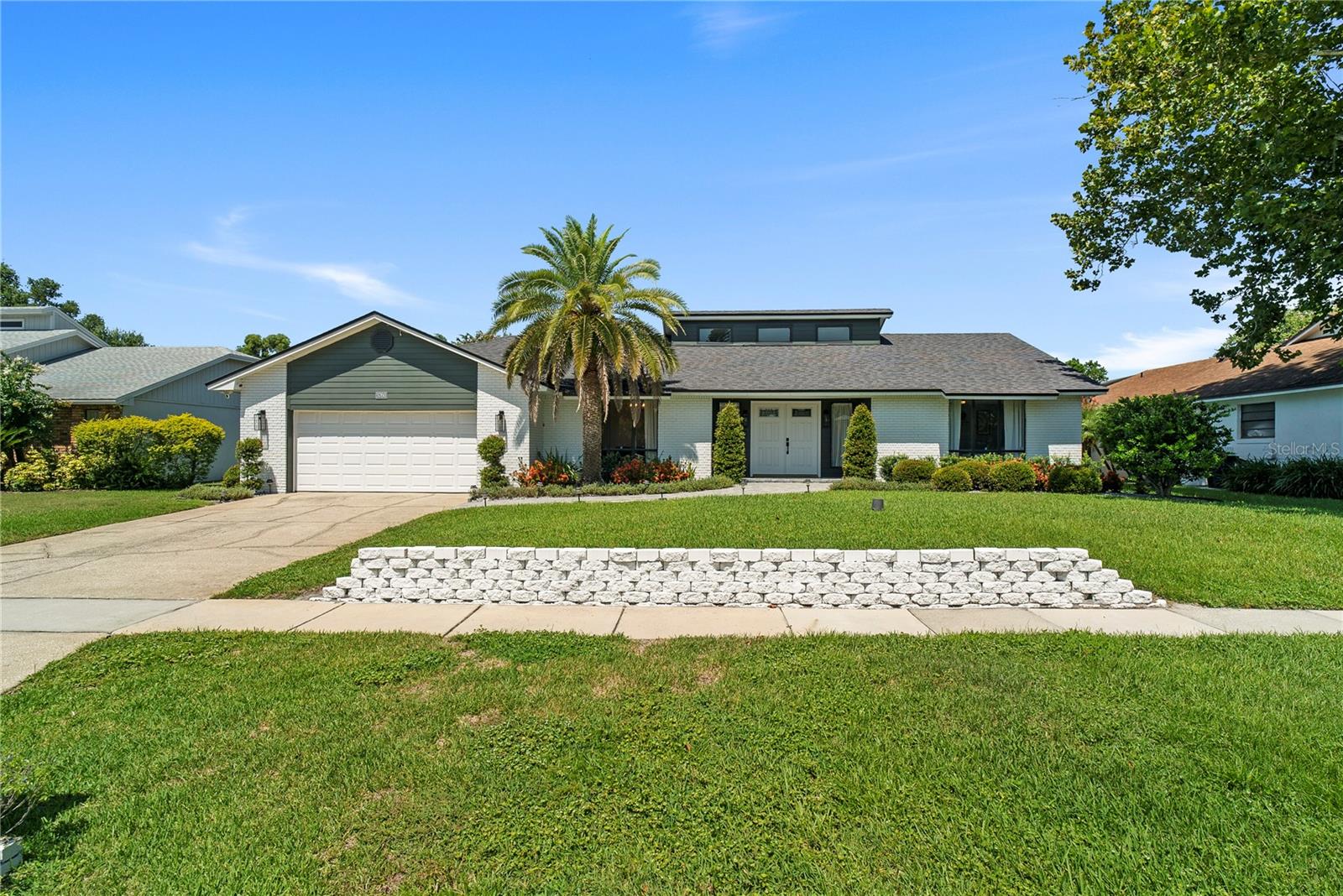 One or more photo(s) has been virtually staged. Welcome to your dream home in the heart of Dr. Phillips! This beautifully upgraded single story 3-bedroom, 2-bath pool home sits on a spacious 0.25-acre lot in a quiet, established neighborhood with no required HOA-offering both privacy and convenience located just minutes from top-rated schools, Restaurant Row, theme parks, shopping, and golf, this home is truly turnkey and perfectly placed. Step inside to discover 2,242 sq ft of thoughtfully updated living space, where modern touchee blend seamlessly with timeless charm. The open and airy floor plan is highlighted by brand-new luxury vinyl plank flooring and base boards (2024), along with fresh lighting and ceiling fans (2023) throughout. The brick surround wood burning fireplace and transom windows make the family room so inviting. This home boasts a split. floor plan which is ideal for family or guests and the bedrooms are situated just right. The oversized primary suite is accompanied by a spa like 5 piece washroom with plenty of storage and access to the walk-in closet and outdoor shower too. Enjoy peace of mind with major upgrades already completed:
New Roof (2023)
New A/C System (2023)
New Hot Water Heater (2025)
New Washer & Dryer (2022)
The spacious kitchen boasts granite counters and large island and overlook a the outdoor oasis, where you'll find the perfect space for entertaining or relaxing year-round. The covered patio and screened in pool include a resurfaced Pebble Tee pool (2021), new pool pump(2023), and freshly painted pool deck (2022). Other outdoor highlights include a charming fountain, separate heated spa, shed with electrical, and fully fenced for the critters and kids. Also, it's plumbed for an outdoor kitchen if desired. The lush, updated landscaping (2023) and fresh exterior paint (2023) has the curb appeal vibes on high. See the meticulous attention to detail and care that is awaiting you now.
Don't miss your chance to own a stunning home in one of Orlando's most desirable neighborhoods. Schedule your private tour today. 5760 Tamarack Dr. checks every box - don't miss your chance to make it yours!!