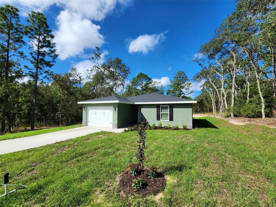 New Construction 3 bedroom 2 bath Home on .27 acres. Located in the up and coming neighborhood of Rainbow Lakes Estates just 30 minutes west of Ocala, 15 minutes from Downtown Dunnellon, and 30 minutes from the Gulf Coast town of Crystal River. This home's upgrades include Stainless Steel Appliances, All Wood Cabinets with soft close hinges, Granite Countertops in Kitchen and Baths, Tile Shower and bathtub wall, Luxury Vinyl Plank Flooring throughout, one and a half car garage with garage door opener & Epoxy floor covering, window blinds, and landscaping. Love the Community you live in! Rainbow Lakes Estates offers a Community Center and a Recreational Park which include playgrounds, tennis courts, racquetball courts, basketball courts, baseball field, walking trails, fitness center, a boat ramp to Tiger Lake, and picnic pavilions. Rainbow River and Rainbow Springs are part of Marion County's Top outdoor attractions and are only a short 10 minute drive from Rainbow Lakes Estates. Enjoy the crystal clear water for kayaking, tubing and outdoor fun. Play a round of golf just 10 minutes away at Nationally recognized Juliette Falls Championship Golf Course. Whether you enjoy outdoor activities and adventure, or prefer to relax and enjoy the beauty of nature, you'll love calling Rainbow Lakes Estates your home.
