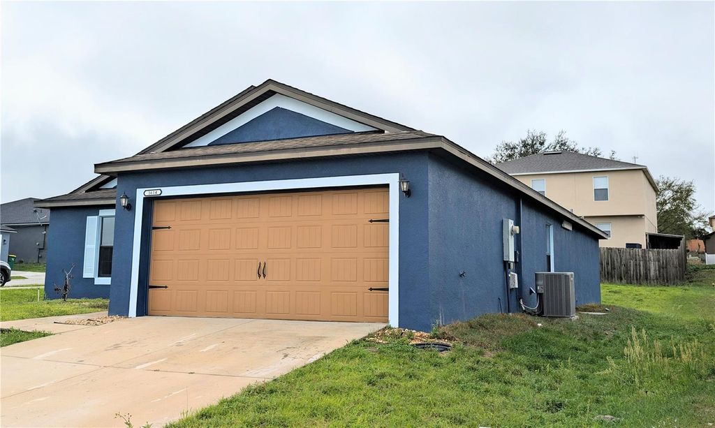 Photo of 1614 Fitzgerald Drive, Dundee, FL 33838 (MLS # S5145541)