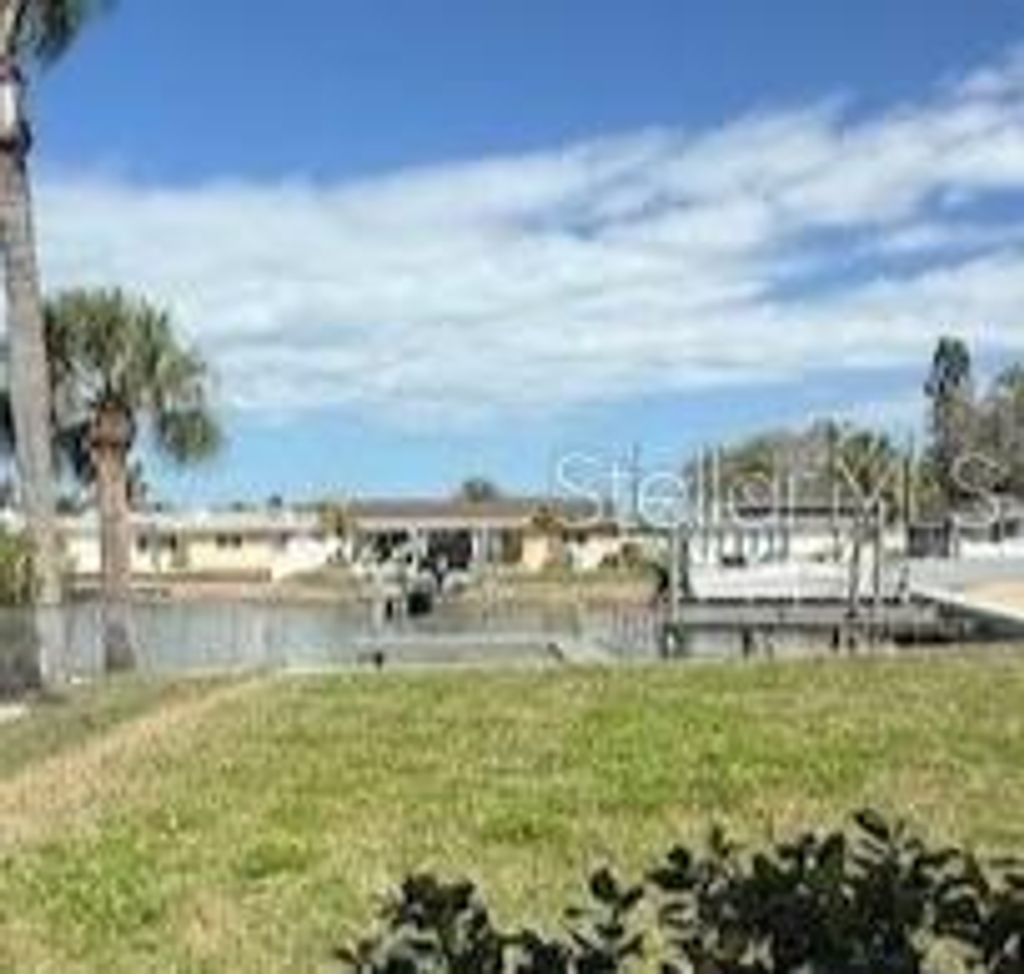 Photo of 4415 Clearwater Harbor Drive N, Largo, FL 33770 (MLS # TB8481601)