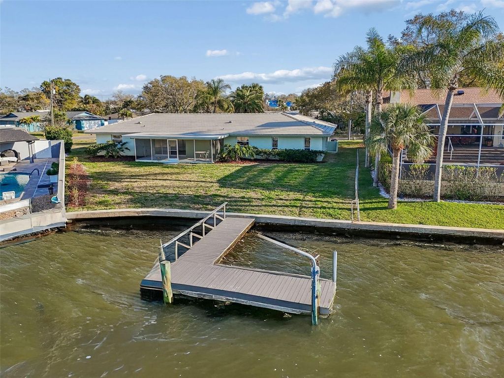 Photo of 4415 Clearwater Harbor Drive N, Largo, FL 33770 (MLS # TB8481601)