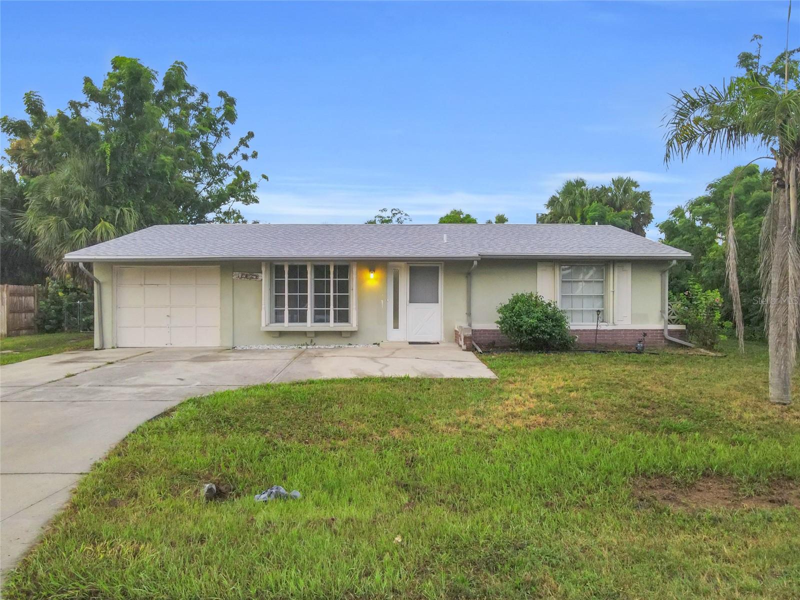 Beautifully updated 4-bedroom, 2-bath , 1-Car Garage home in the heart of Port Charlotte! This property offers a spacious open layout, modern finishes, and a large backyard perfect for boats, RVs, or all your outdoor toys. Enjoy the bright kitchen, stylish bathrooms, and fresh flooring throughout. The expansive lot provides privacy and endless possibilities for entertaining or adding your dream pool. Ideal as a primary residence or a fantastic investment opportunity! City water and Sewer! No HOA!!