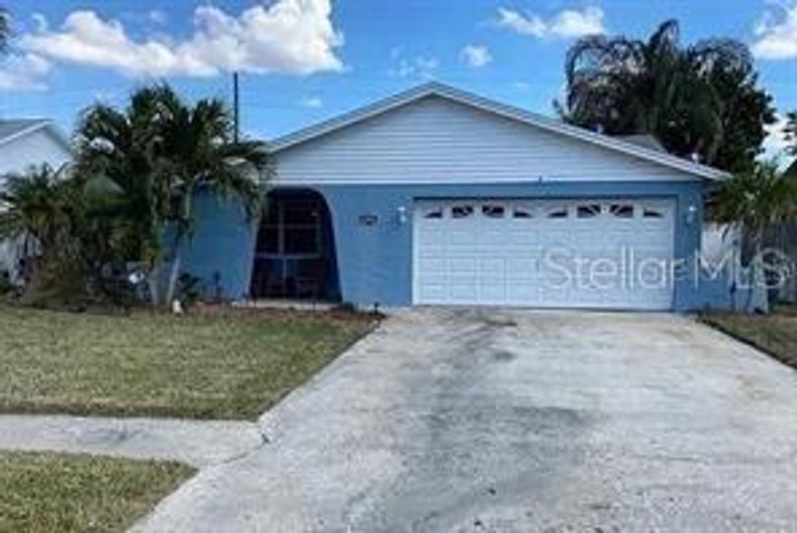 Don't miss this one! 3 Bedroom, 2 Bath, 2 Car garage in a great family neighborhood. Split Plan home. Updated flooring throughout, stainless steel appliances, ice cold 20 Seer A/C from 2017, smart thermostat, large screened in back porch. With multiple beautiful Gulf Beaches less than 15 minutes away and a private, fenced-in backyard, encompassed with beautiful palms and landscaping, this property is perfect for a family. Approximately 4 miles to some of the best public & private schools in the area, grocery stores, Seminole Mall shopping, restaurants, and all your essentials less than 1 mile away. Right next to the Pinellas trail and Walsingham Park access on the same street. Non evacuation zone.