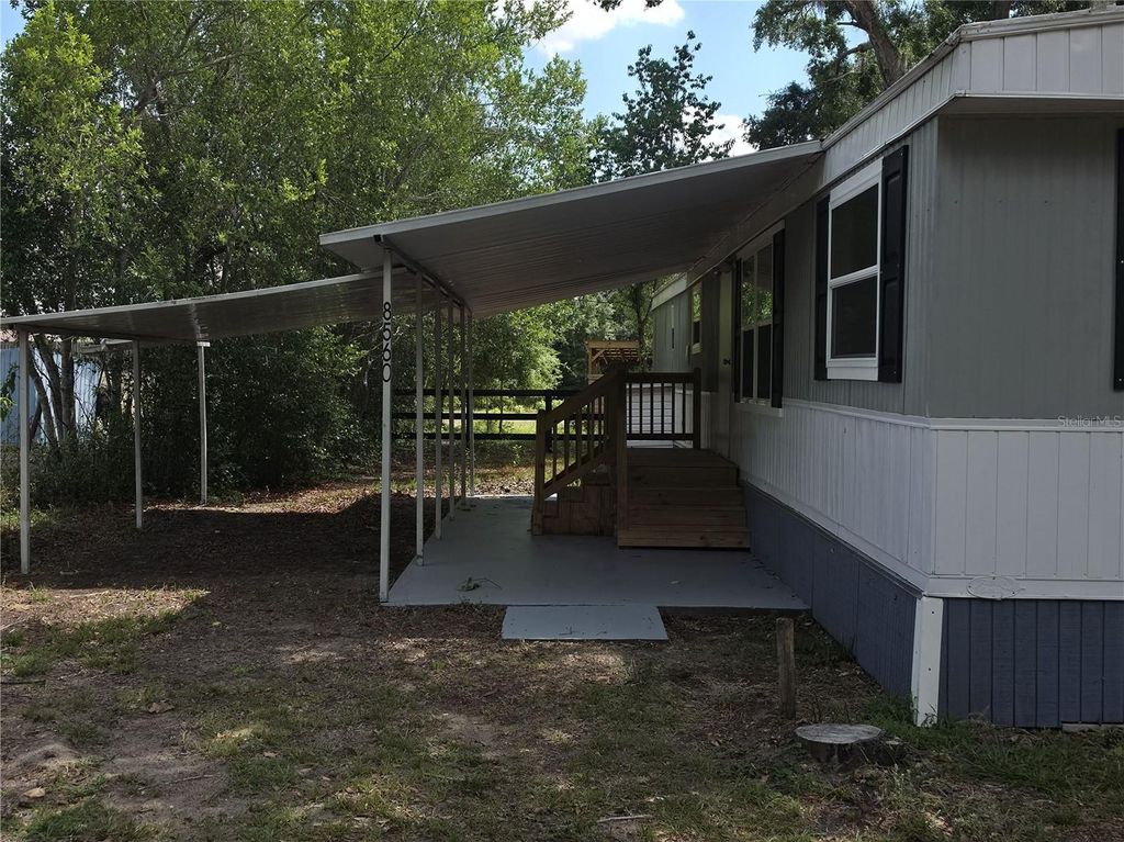 Photo of 8552 SE 128th Lane, Summerfield, FL 34491 (MLS # OM724378)