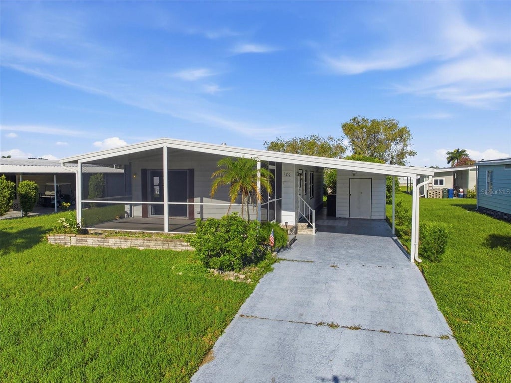 Photo of 129 Nautical Drive, North Port, FL 34287 (MLS # N6145244)