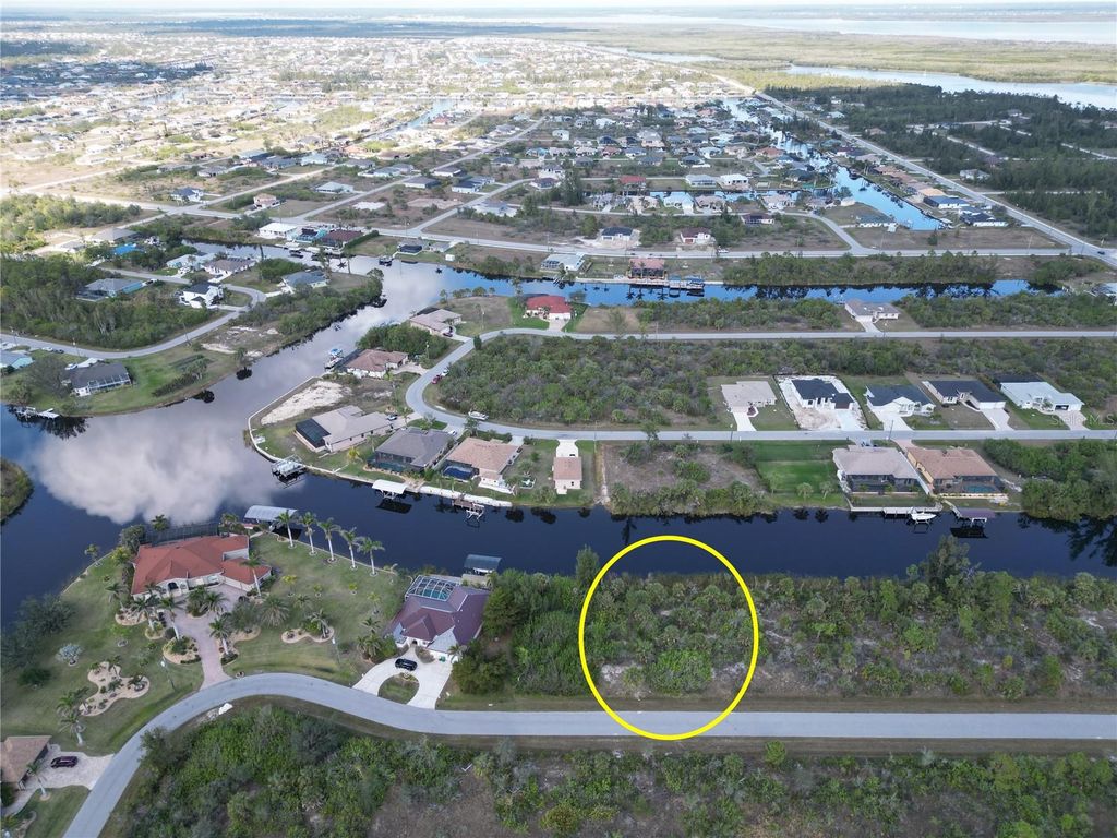 Photo of 15448 Aribe Avenue, Port Charlotte, FL 33981 (MLS # D6140718)