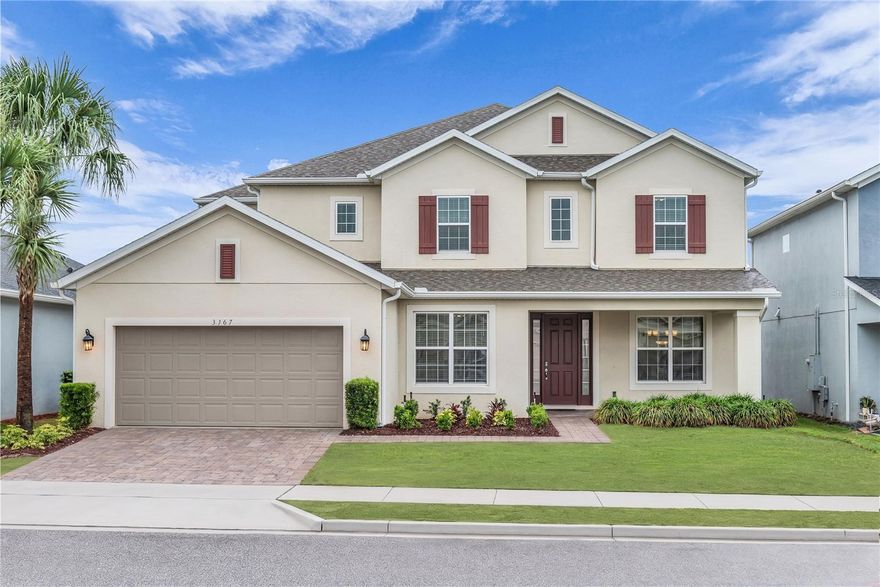Stunning, meticulously maintained home in the sought-after Lakeview Preserve community of Winter Garden! This spacious residence is situated on a premium lot close to cul-de-sac limiting through traffic and offers a thoughtfully designed layout ideal for both everyday living and entertainment. A grand two-story foyer welcomes you inside and features a Maitland-Smith designer chandelier with electric hoist allowing it to easily raise and lower. Foyer is bordered by a formal dining room and a private home office with French doors, perfect for remote work or a quiet retreat. The heart of the home is the expansive open-concept living area, where a gourmet kitchen overlooks the family room and includes a cozy dinette. The kitchen is beautifully appointed with 42” cabinets, granite countertops, tile backsplash, stainless steel appliances, built-in oven, water filtration system, an oversized center island with breakfast bar, and a large closet pantry. A convenient butler’s pantry connects the kitchen to the dining room, ideal for prep, storage, and seamless entertaining. Enjoy true indoor-outdoor living with pocket sliding glass doors that fully open to a spacious, screen-enclosed lanai, perfect for relaxing or hosting gatherings. The first-floor primary suite offers a luxurious retreat with dual walk-in closets and ensuite bath featuring a garden tub, large glass-enclosed shower, and dual vanities with custom upper cabinetry. Upstairs, a huge loft anchors the second level and offers versatile flex space. A second primary bedroom with walk-in closet and private bath is perfect for guests or multi-generational living. Bedroom 3 is adjacent with a neighboring full bath. Bedrooms 4 and 5 feature individual vanities and share a Jack-and-Jill bath with tub/shower combo, completing a functional second level split-bedroom floor plan. This home showcases hardwood floors and ceramic tile throughout for maximum durability. Upgrades include gutters, fresh sod and landscaping, and an epoxy-coated garage floor, adding both beauty and durability. This exceptional home combines space, style and functionality in one of Winter Garden’s most desirable locations. Lakeview Preserve offers residents top notch amenities including a resort style pool with splashpad, playground, fitness center, clubhouse and dock. Situated conveniently between Downtown Winter Garden and Clermont with a multitude of shopping, dining and entertainment options and just 10 minutes to SR 429 offering convenient access to Turnpike and SR 408 for easy commuting to downtown Orlando, Disney and surrounding areas. Schedule your private showing today!