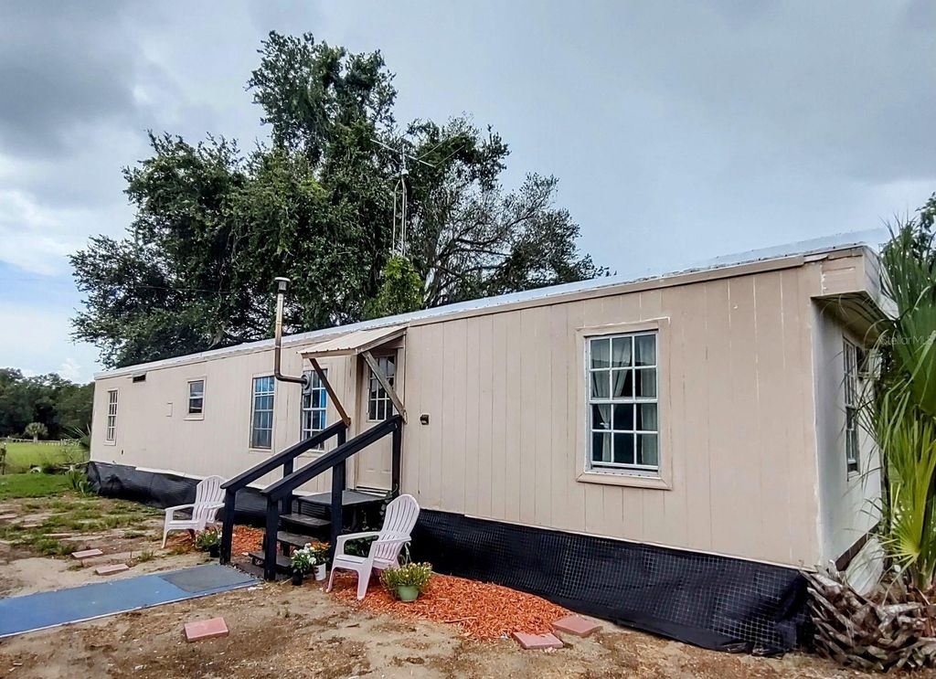 Photo of 17936 SE 95th Street Road, Ocklawaha, FL 32179 (MLS # TB8406432)