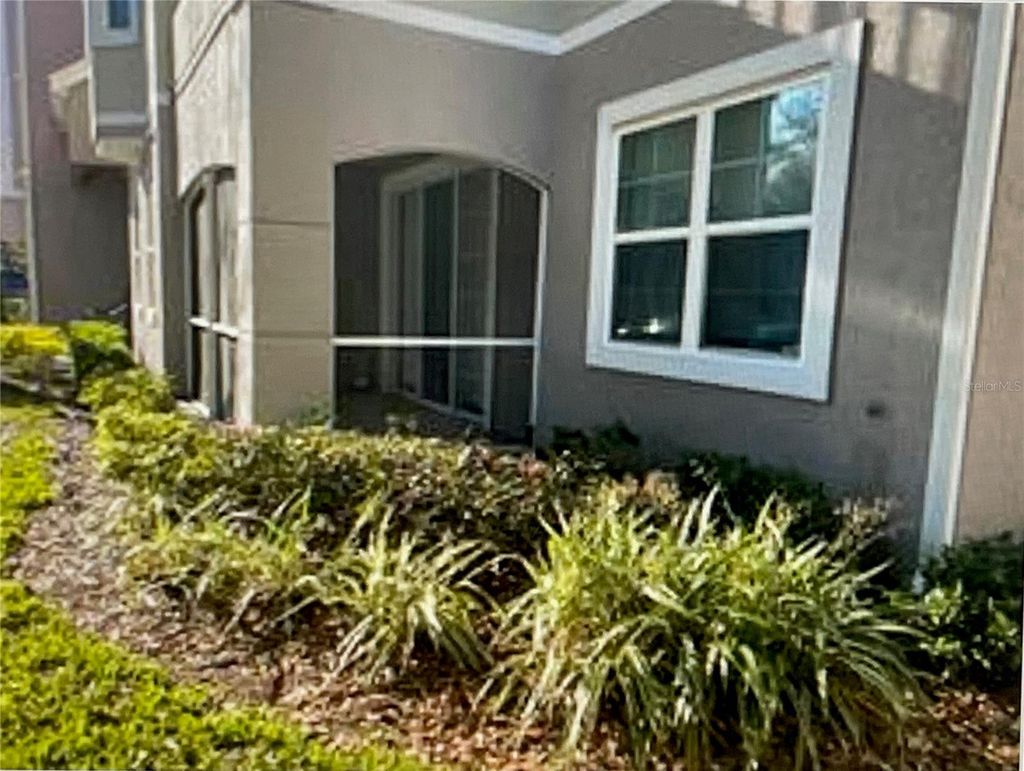 Photo of 6685 Queens Borough Avenue #107, Orlando, FL 32835 (MLS # O6379598)