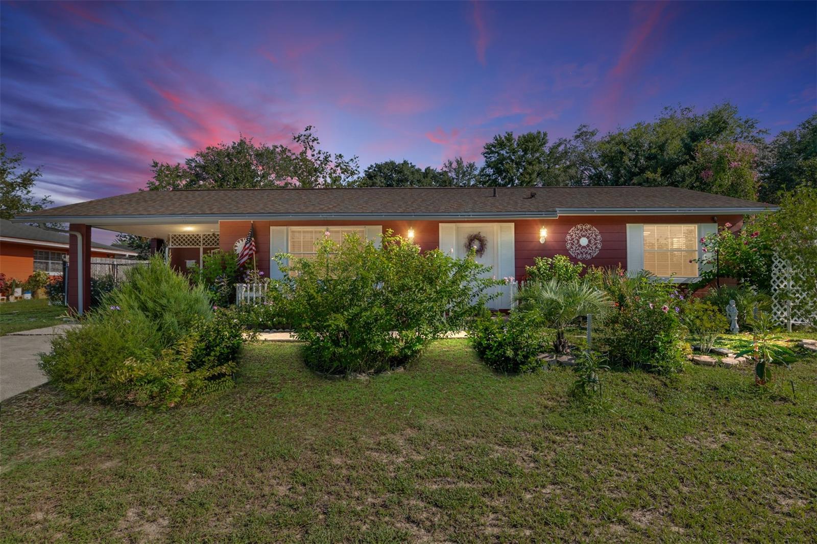 Charming Marion Oaks Retreat – Priced to Sell! Welcome to this beautifully landscaped 2-bedroom, 2-bath concrete block home, ideally located in the heart of Marion Oaks. Enjoy the new LVT flooring perfect for low-maintenance living. The home features two bedrooms, including a primary suite with a private bathroom. Step outside to a covered porch. Additional highlights include gutters, 2023 roof, newer AC and brand new water heater. The 3 large wall mounted TV's also stay! The backyard includes a small outside cooking area including a 2nd fridge and a large 8x12 storage shed. Furnished available if desired. Located minutes from schools, 484, I-75, shopping, dining, parks, and medical facilities. Schedule your showing today! Homes at this price point won’t last long!